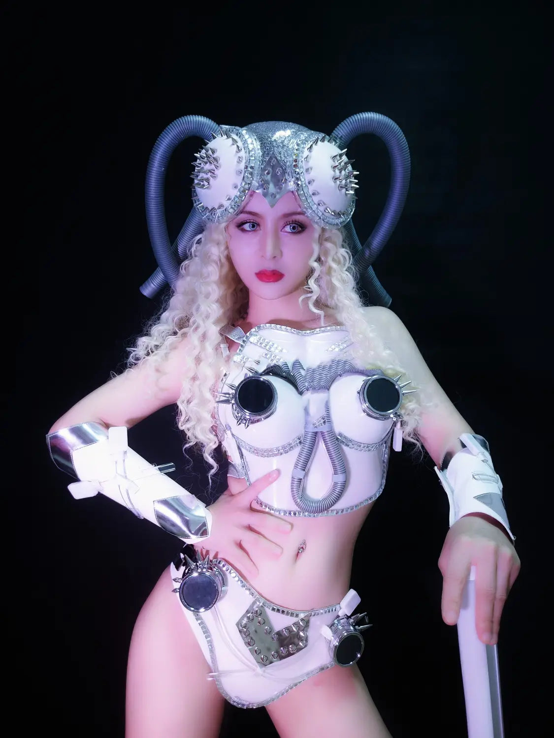 A futuristic white and silver metallic night elf shop bar future technology suit featuring studded accents, a horn-like headpiece, and armored arm guards.