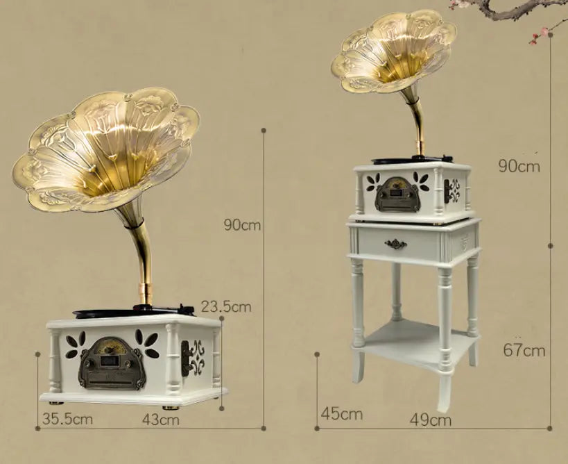 Vintage white gramophone with a gold-toned flower-shaped horn and ornate cabinet detailing ideal for a classical living room or room tea stereo setting.