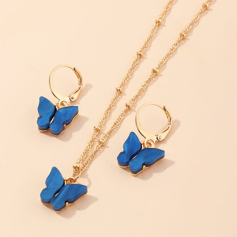 blue butterfly-shaped creative fashion resin earrings and matching resin butterfly necklace with gold-toned chains.
