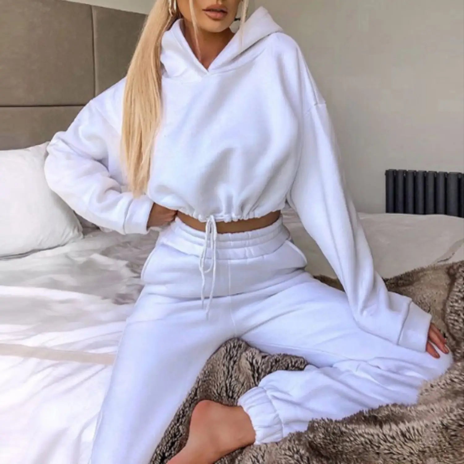 white cropped hoodie sweatshirt with drawstring waistband and matching joggers from the pink piece sweatsuits tracksuits sexy cropped set in a comfortable cotton blend for stylish casual wear