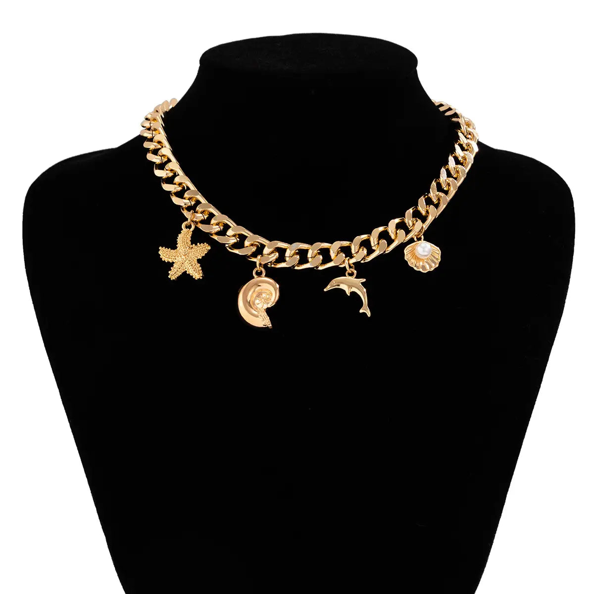 Gold-toned chunky chain choker necklace adorned with starfish, seashell, dolphin, and spiral shell charms from the boho conch dolphin starfish choker necklace bracelet set.