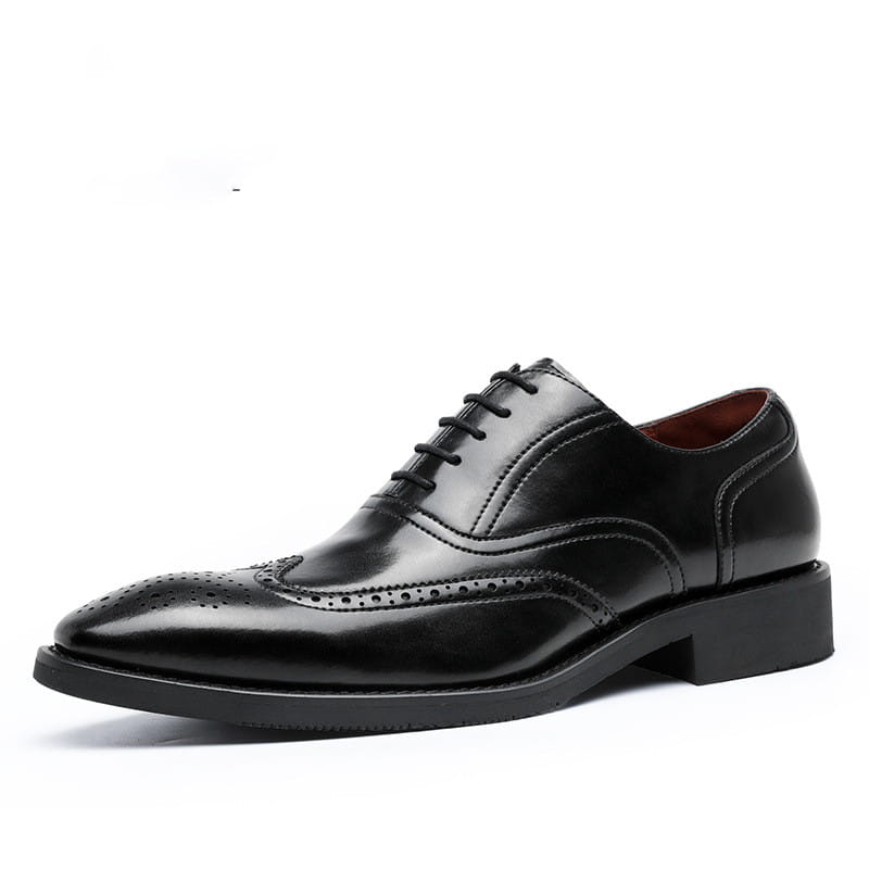 Men black leather shoes with brogue detailing and rubber sole featuring a low heel and classic oxford design