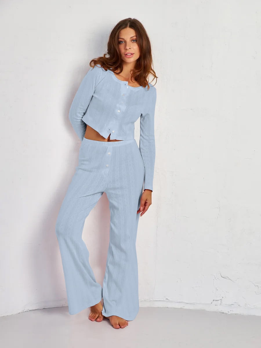 light blue ribbed knit pajama set with button front top and wide leg pants paired with a white ribbed knit fashion cardigan long sleeve.
