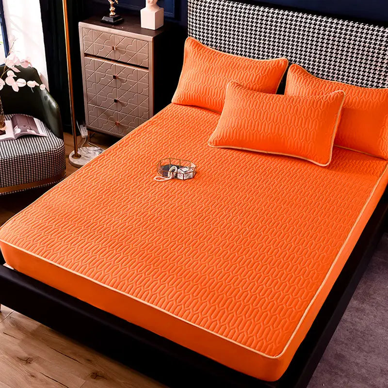 bright orange quilted thickened all-inclusive dust-proof single-piece fitted sheet with subtle textured pattern and matching pillowcases