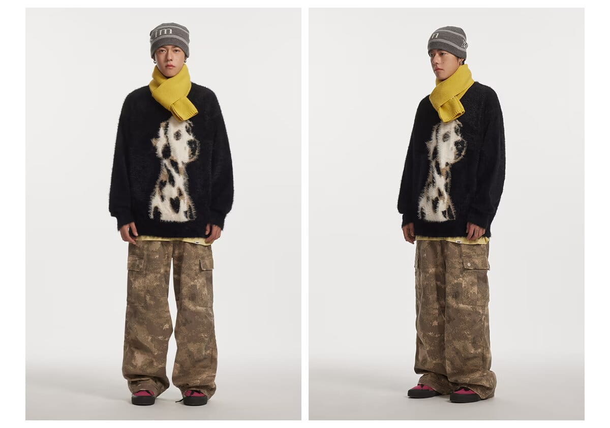 Black sweater featuring a white and black dalmatian puppy jacquard mink design made from jacquard mink cashmere knitted fabric.