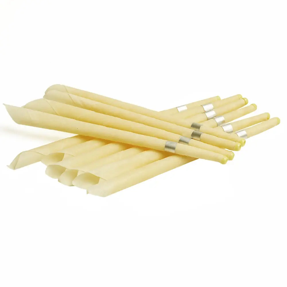 a set of pale yellow slender coning beewax natural ear candles with metallic silver bands near the tips designed for ear healthy care and wax removal