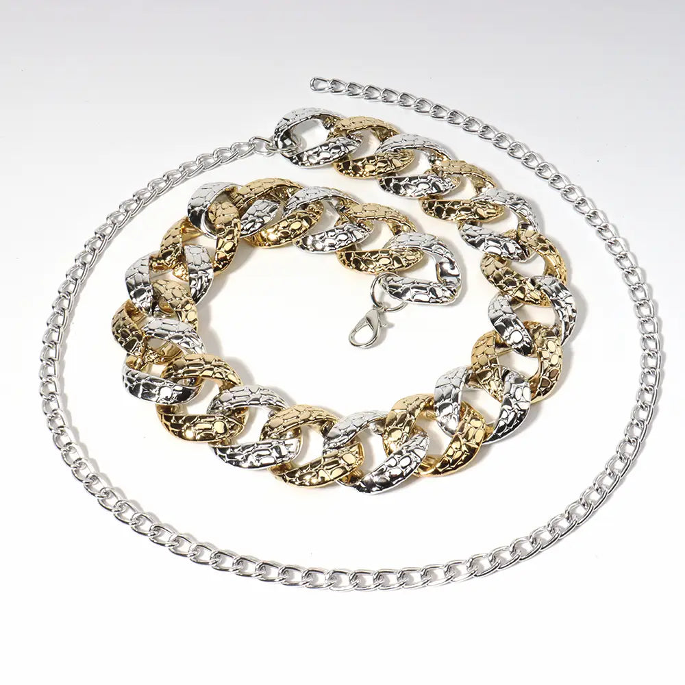 Two tone chain summer body jewelry belt featuring a textured design with alternating gold and silver links.