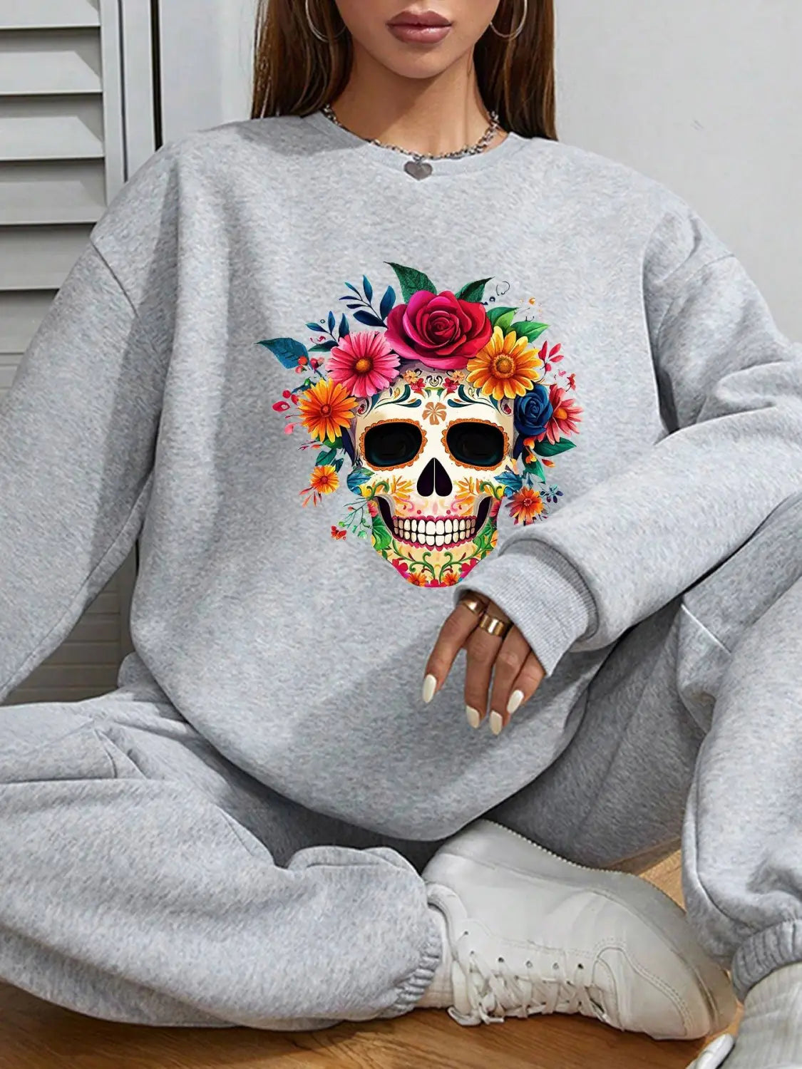 gray crew neck sweatshirt with a vibrant colorful floral skull design suitable for daily wear basic long sleeve apparel