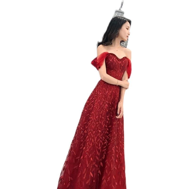 A shimmering red off-the-shoulder evening dress featuring intricate leaf-patterned lace and delicate ruffled sleeves designed as a lace slim slimming bridal gown.
