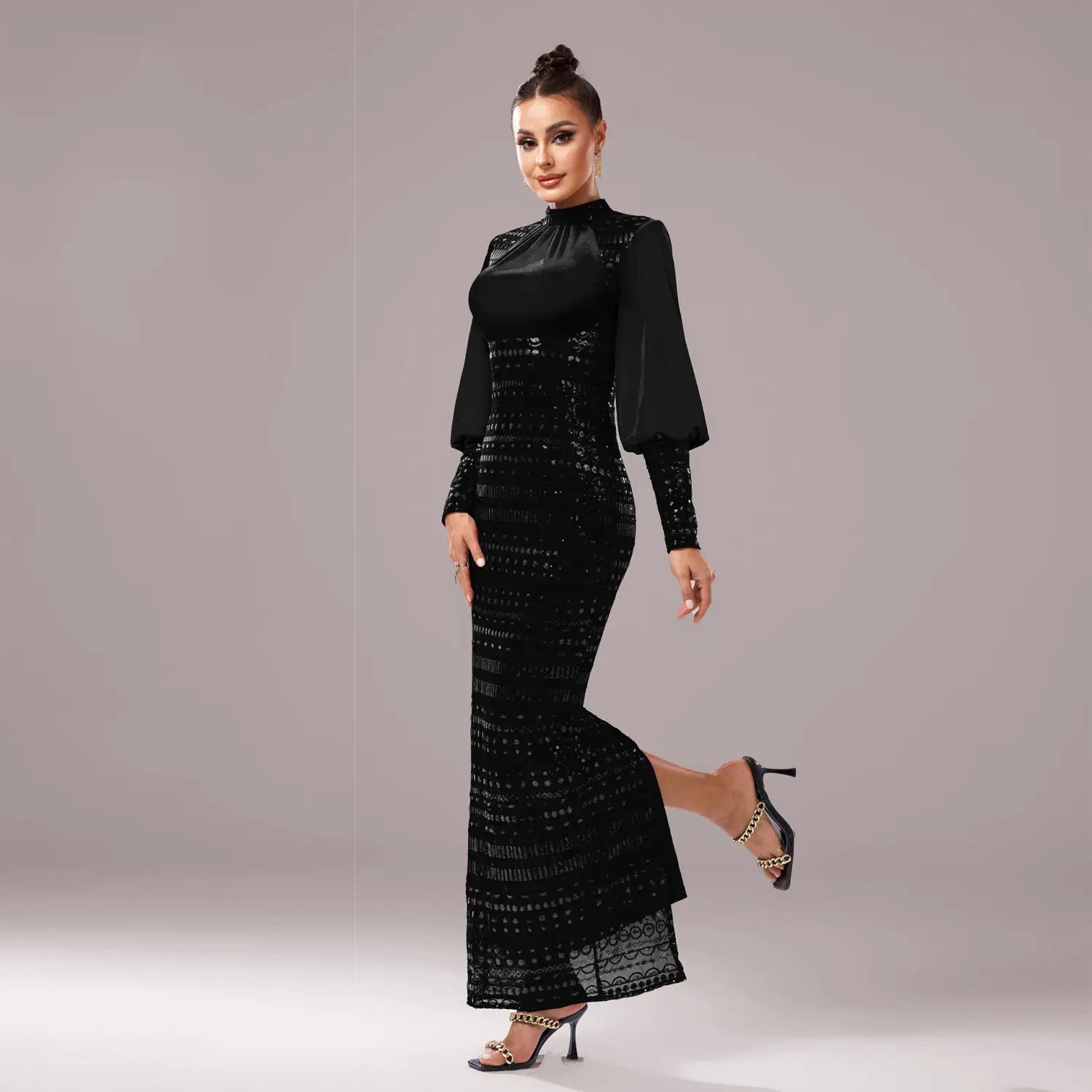 Black long sleeve round neck sequined maxi dress featuring a mermaid silhouette with sheer lace detailing and bell sleeves.