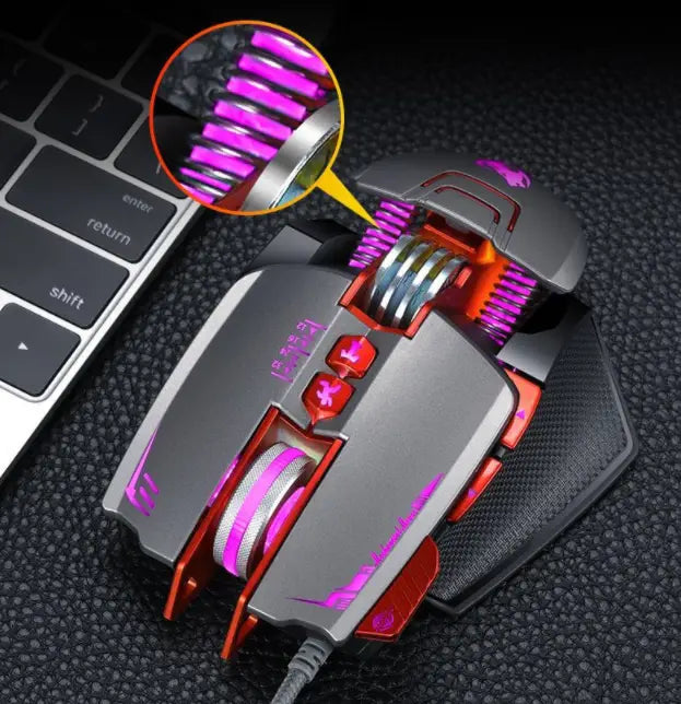 a sleek silver and red thunder wolf v9 gaming mouse with vibrant purple led lighting along its sides and buttons designed for precise gaming performance.