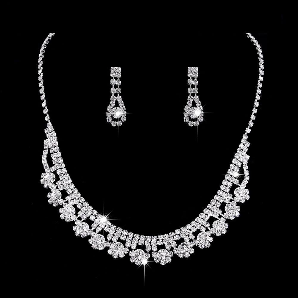 sparkling silver rhinestone zircon water drop necklace with floral design and matching drop earrings set.