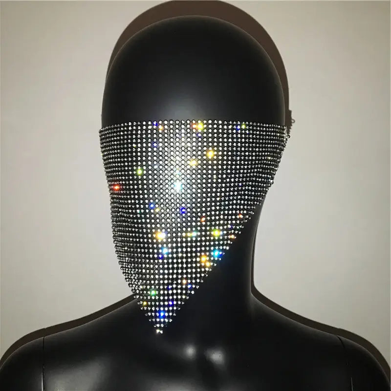 A dazzling black mesh flash jewelry mask adorned with a dense array of multicolored sparkling rhinestones features an explosive metal flash design.