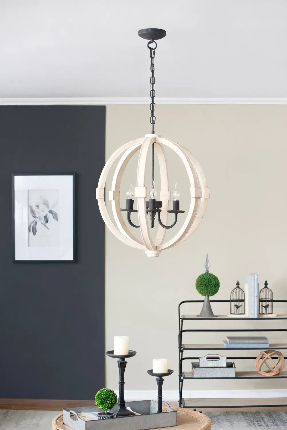 Rustic white globe light wood chandelier with a white wooden spherical frame, black metal accents, and four candle-style bulbs.