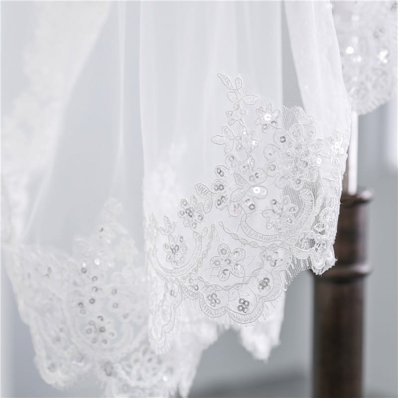 A short veil soft mesh sequined lace white ivory featuring delicate white lace with intricate floral embroidery and sparkling sequins.
