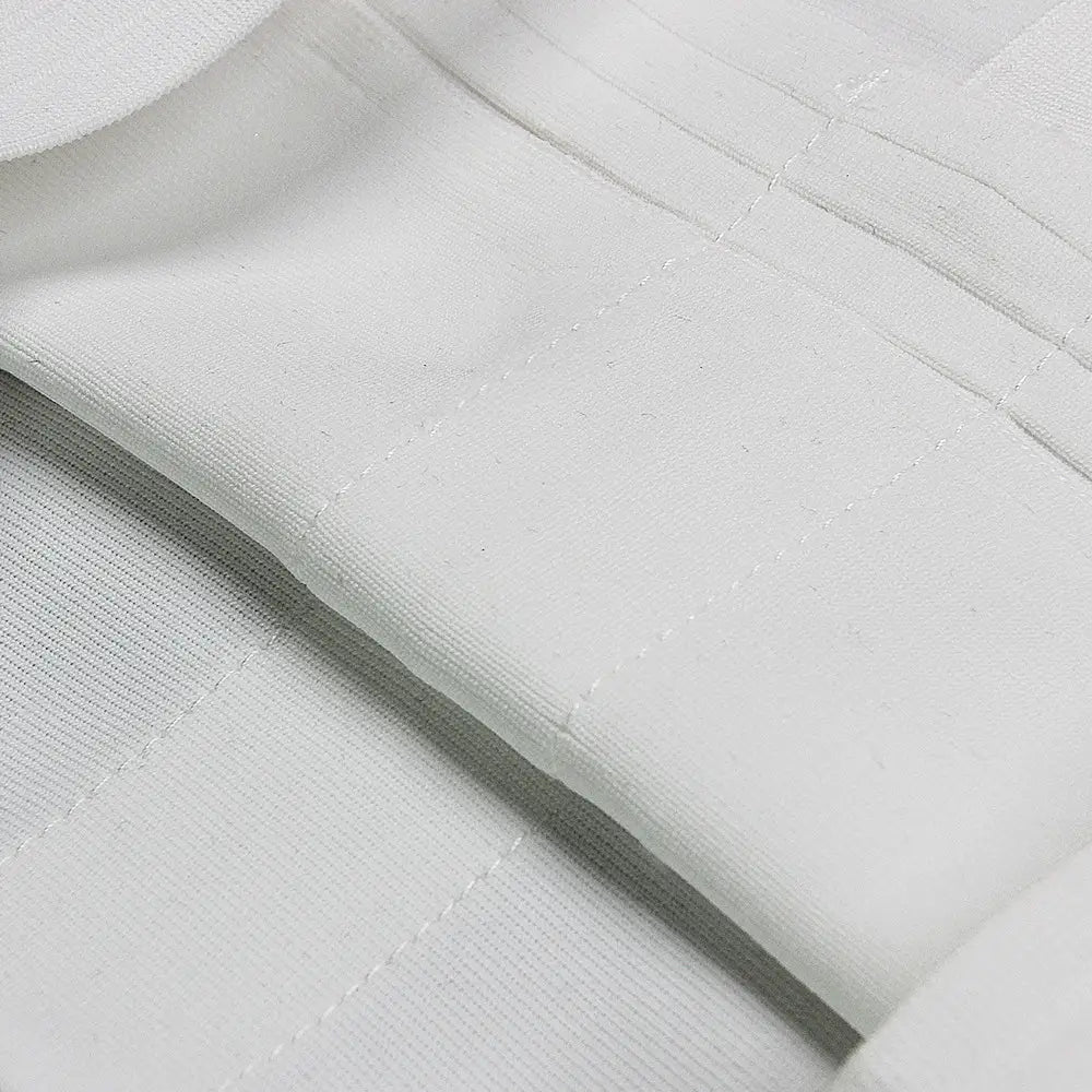 White high neck chest scheming hip short skirt made of white cotton fabric with subtle vertical stitching and a soft smooth texture