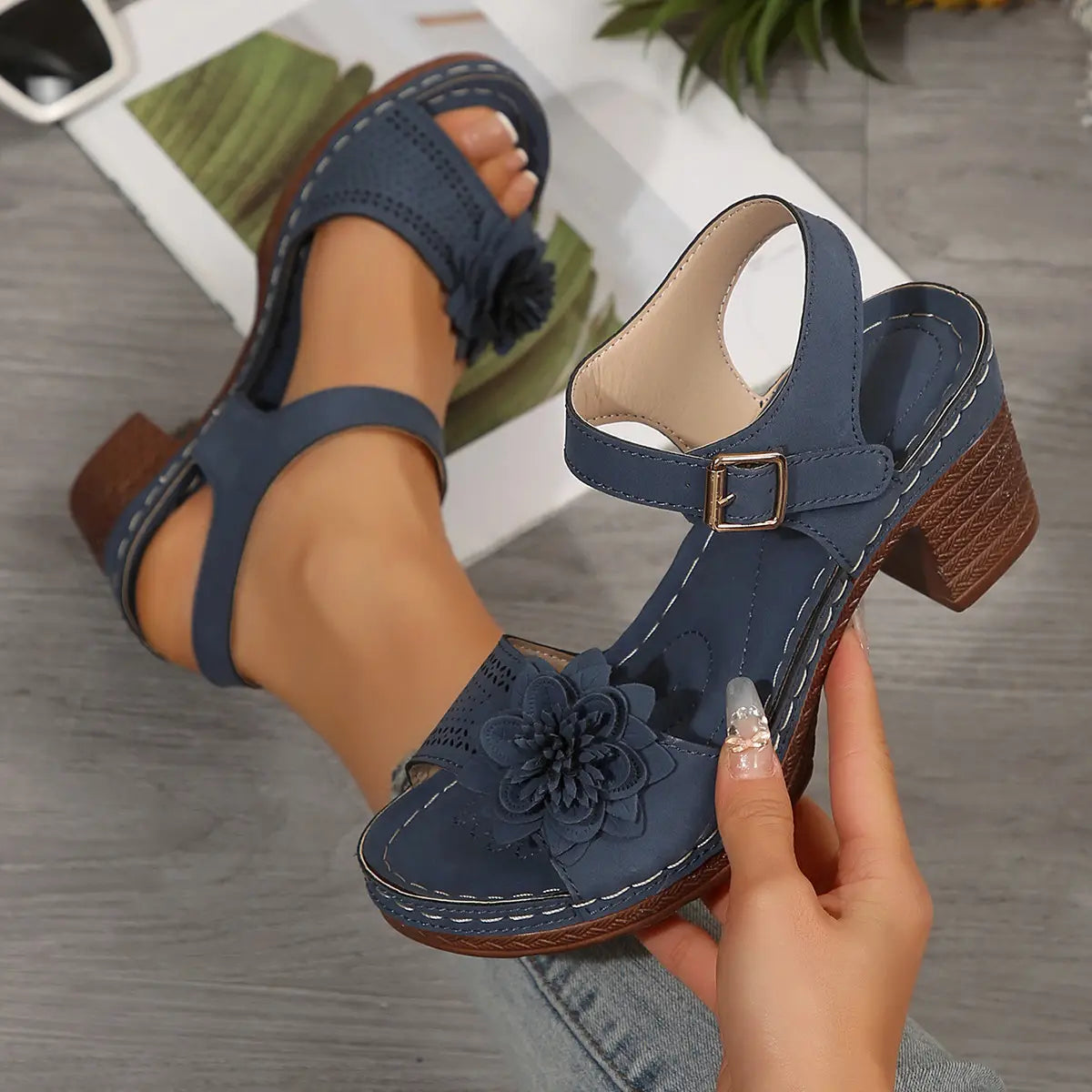 Navy blue leather chunky heel sandals with floral embellishment and brown block heel ideal for heel sandals summer.