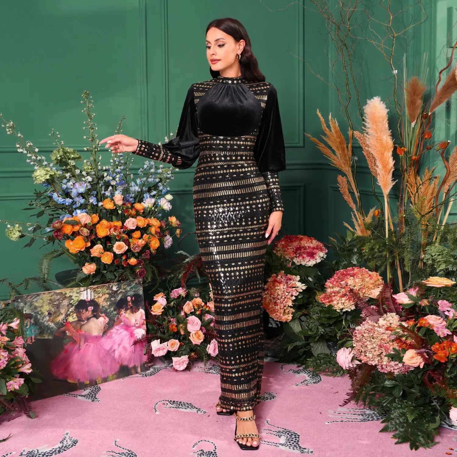 black lace long sleeve round neck sequined maxi dress featuring a black sequined midi design with long sleeve velvet sleeves and gold metallic accents along the bodice and skirt