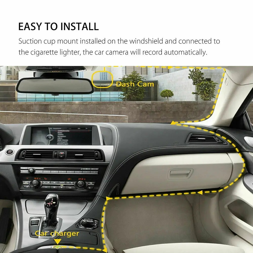 Black dash cam with suction cup mount installed on windshield featuring dual lens 1080p video recorder for vehicle surveillance.