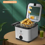 Silver Kaisa villa electric air fryer with black accents and transparent lid cooking golden french fries and fried chicken