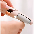 Rose gold and beige electric foot file with a sleek, modern design.