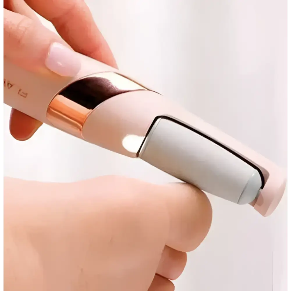 Rose gold and beige electric foot file with a sleek, modern design.