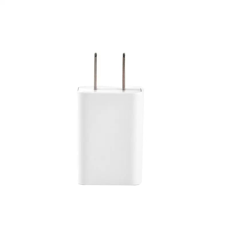 White rectangular wall charger with two metallic prongs for sensa-light head electric hair removal device