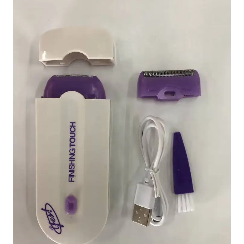 Electric hair removal device with sensa-light head in purple and white includes detachable razor, usb cable, and brush