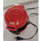 Red raf electric hamburger maker with glossy finish and black power cord for egg toasting and waffle making