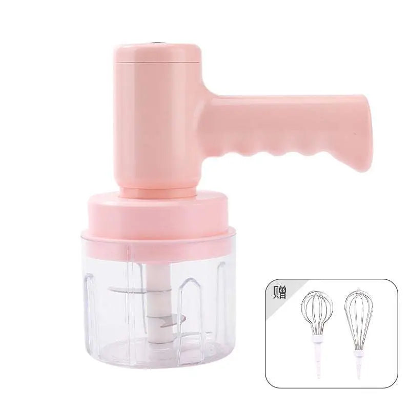 Pink electric hand whisk and food processor set with clear acrylic bowl, two metal whisks, and speed settings for cream blending
