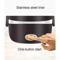 Black electric multi-function lunch box with stainless steel bowls and orange illuminated one-button start