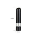 Black electric pepper mill with clear glass section and silver top in an electric salt–pepper grinder set with clear view