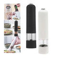 Electric salt pepper grinder set with sleek black and white matte finish and clear chamber revealing peppercorns inside