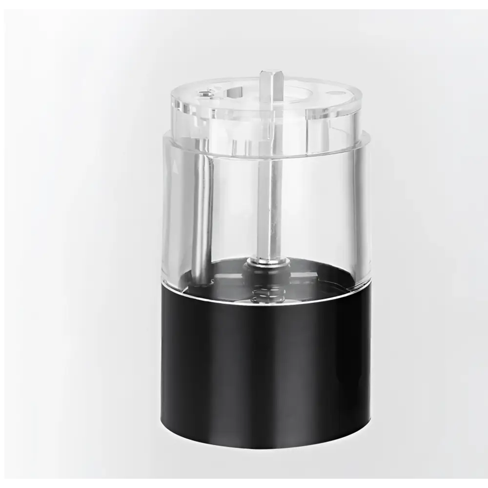 Transparent acrylic pencil sharpener with black base and metallic components displayed alongside electric salt pepper grinder set