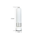 White electric salt–pepper grinder with clear glass section and silver metal accents in salt–pepper grinder set