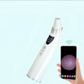 White and silver handheld electric visual blackhead suction with digital display and sleek ergonomic design for skin analysis