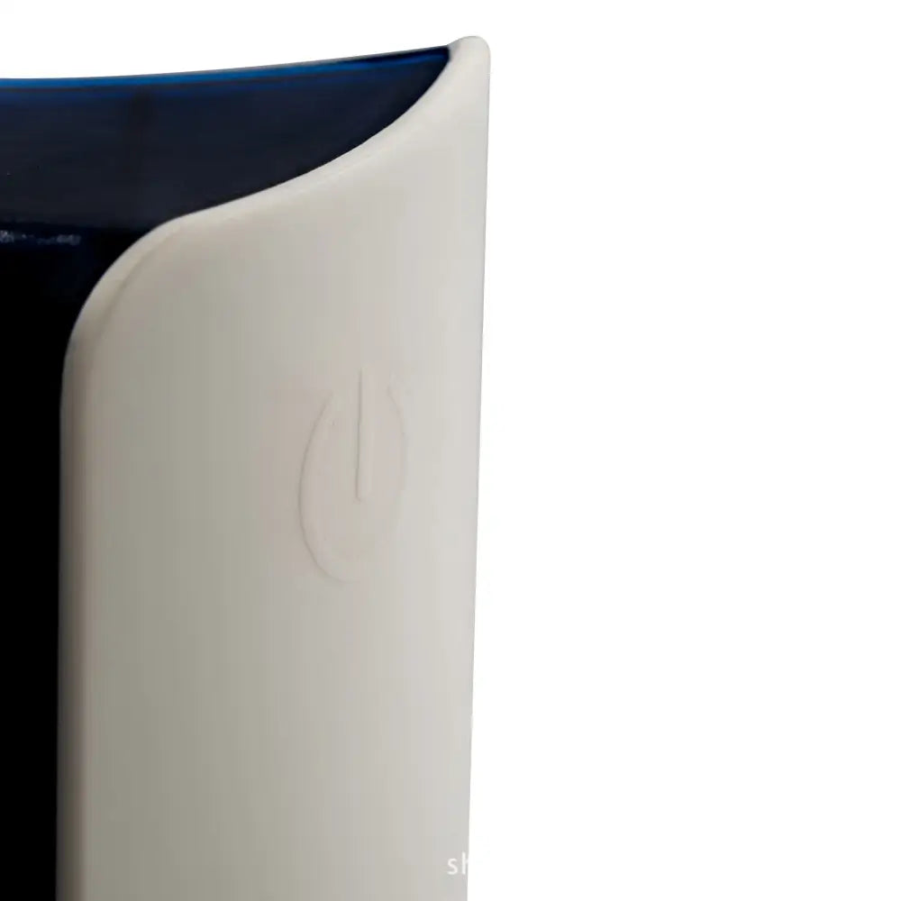 White plastic power button on dark blue electronic rat control device with led lighting for effective ultrasonic frequency control