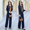 Brown leather handbag with curved top handle and black interior lining paired with elegance retro casual denim jacket and pants set featuring gold-tone buttons