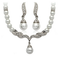 Silver-toned elegant angel wings pearl necklace with central drop pendant and crystal-encrusted curved ear cuffs wings pearl set