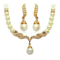 Elegant angel wings pearl necklace and earring set with gold-toned metal cream pearls and sparkling rhinestones