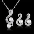 Elegant bride wedding silver musical note pendant necklace with crystals and pearls paired with matching pearl two piece earrings