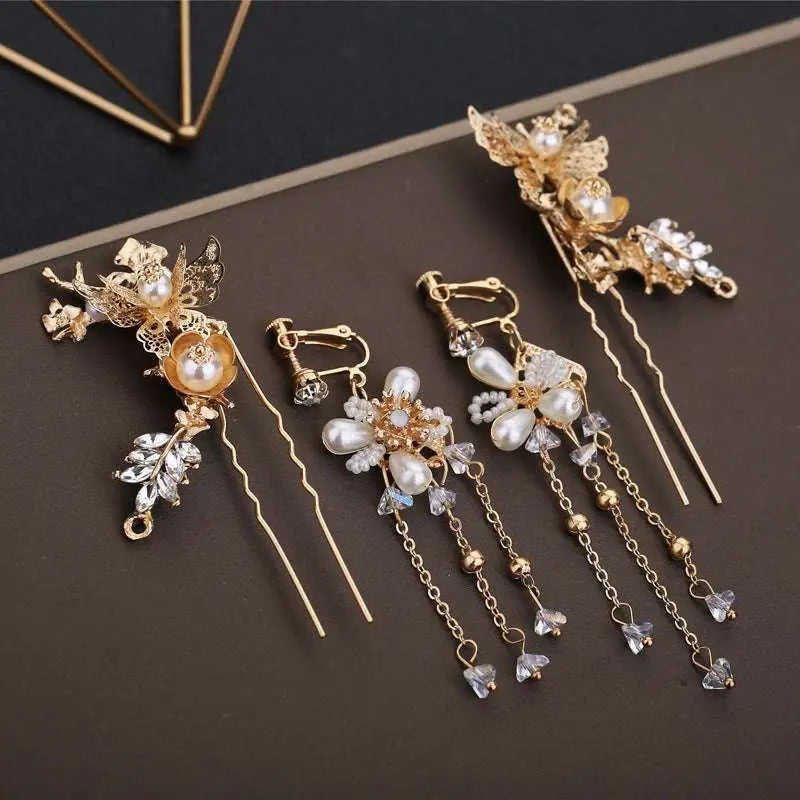 Elegant chinese bridal jewelry gold-toned hairpins with intricate floral designs pearls and dangling crystal chains