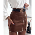 Brown rivets pu leather mini skirt with silver studs along the side seam and hemline for elegant fashion wear