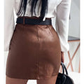 Elegant fashion rivets pu leather mini skirt in brown with silver studs featuring a sleek high-waisted design and structured seams
