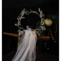 Elegant white floral bridal wreath veil adorned with delicate lace and sparkling beads for wedding use
