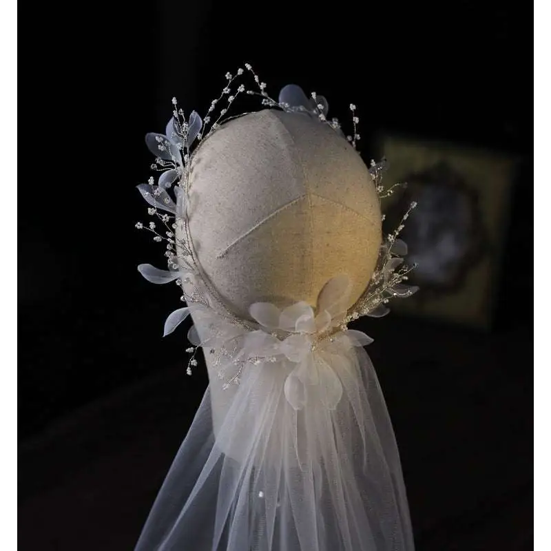 Elegant ivory floral bridal wreath veil adorned with lace, crystal beads, and a flowing tulle bridal wreath veil