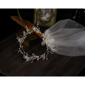 Elegant floral bridal wreath veil in silver tone adorned with sheer white organza flowers and sparkling crystal beads