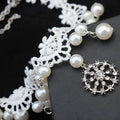 Elegant jewelry bride white lace pearl choker set featuring a silver crystal encrusted circular pendant