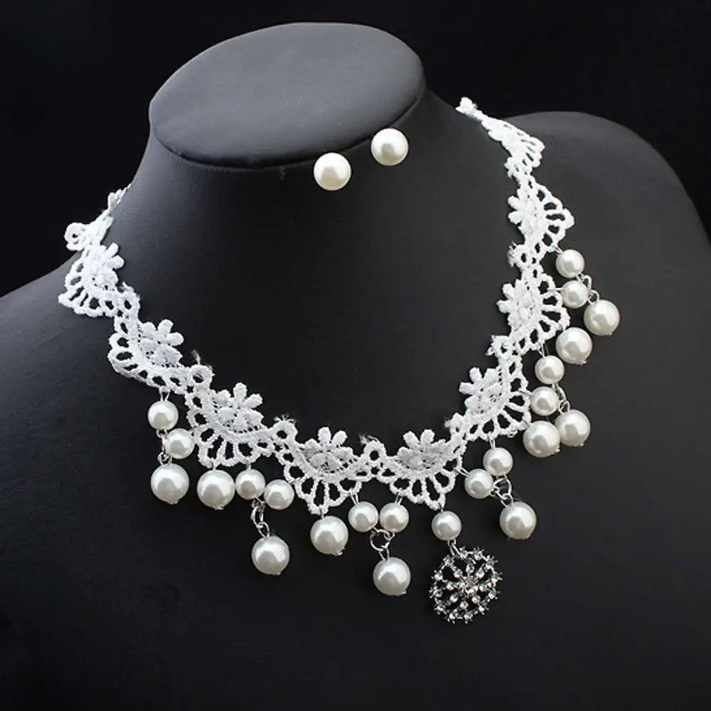 Elegant jewelry bride lace pearl choker set featuring a white lace necklace with dangling pearls and crystal pendant