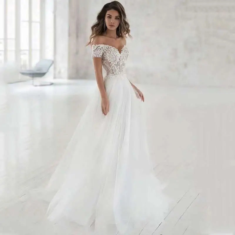 Elegant lace light wedding dress featuring a white off-the-shoulder wedding gown with intricate lace detailing and tulle skirt